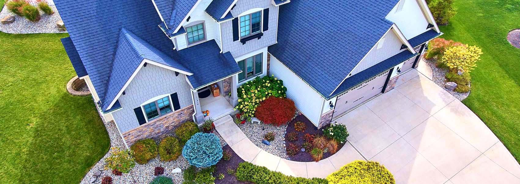 Aerial view of a house taken by a drone during a home inspection