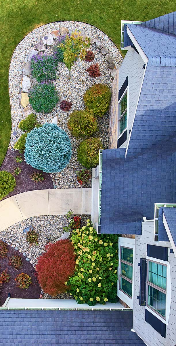 Aerial view of a house taken from a drone while preforming home inspection services